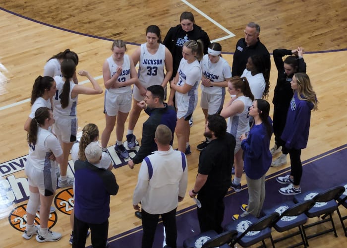 Jackson head coach Anthony Butch talks to his team during a win over Lake on December 16, 2023. Photo credit: Ryan Isley, SBLive Sports